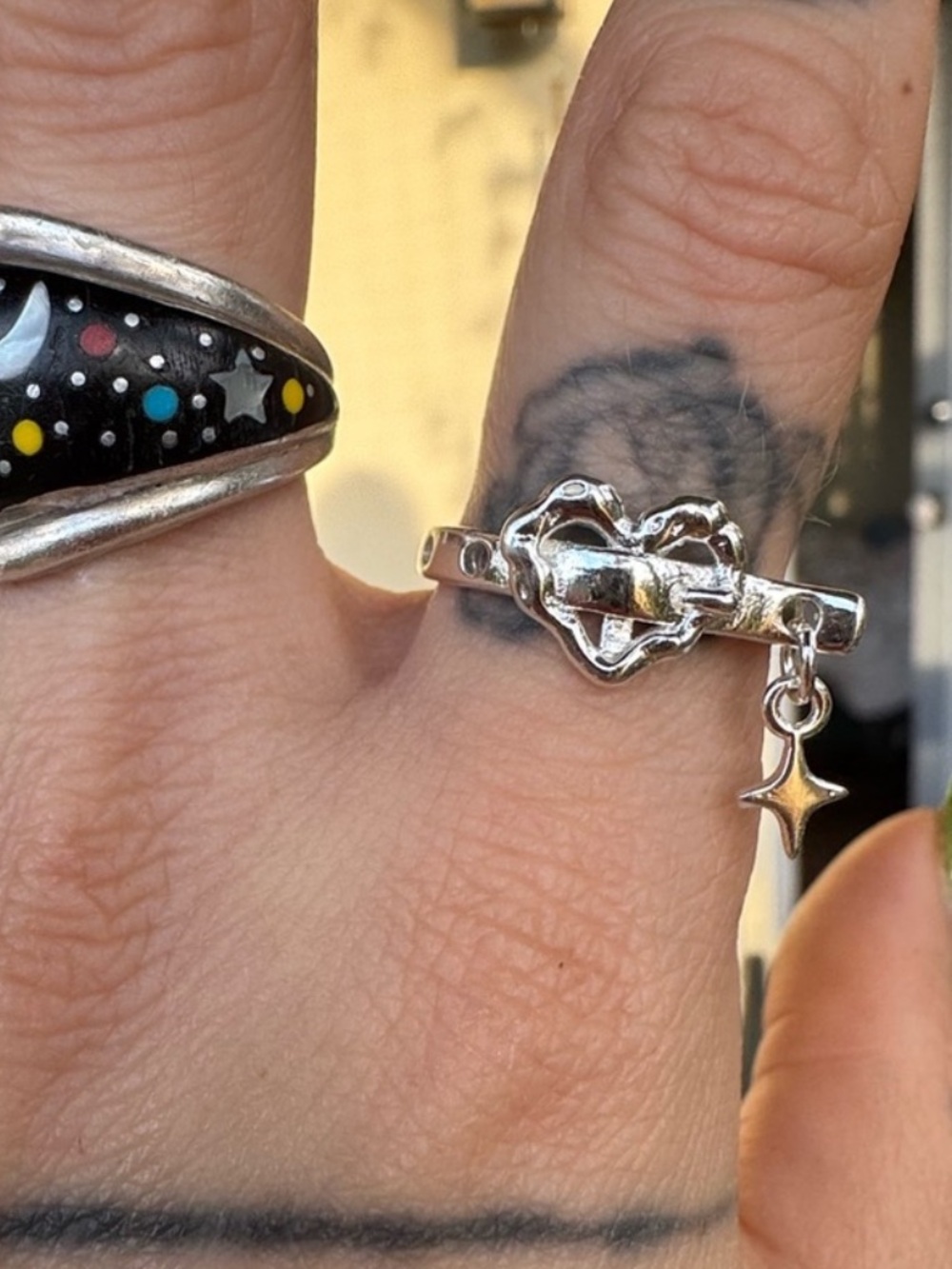 Silver toned Heart Shaped Ring with little star